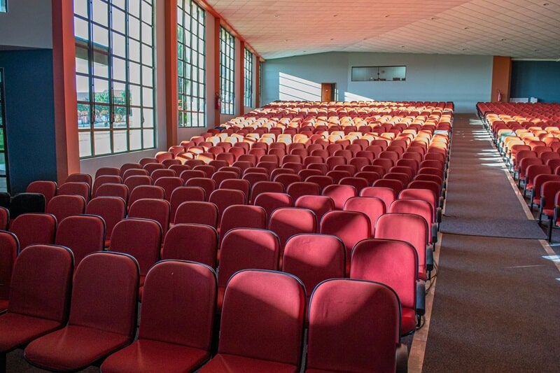 red color chairs in a banquet hall